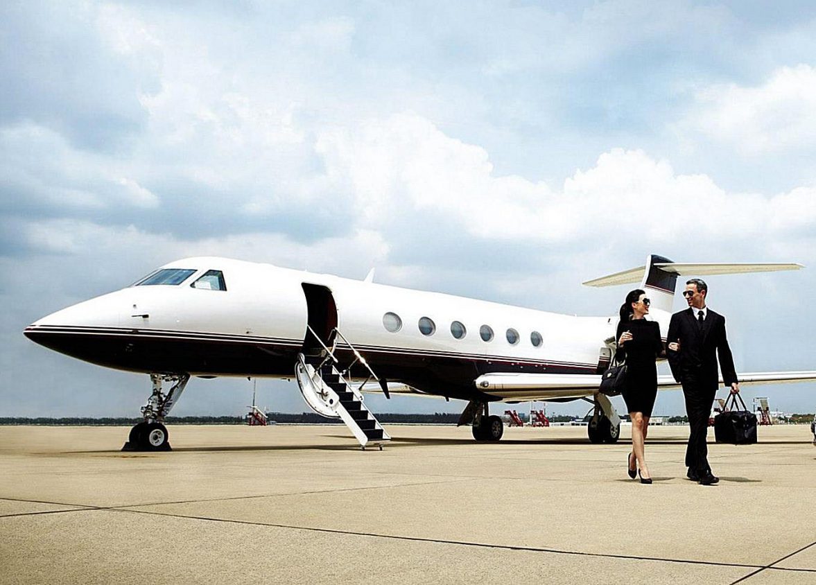 Private jet on tarmac. Passengers used DISTANCE CARD jet card to book their trip